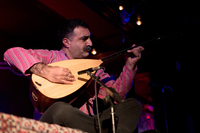 Erdal Erzincan performed with a bağlama, which is a Turkish stringed instrument, similar to a guitar. This was both Kalhor and Erzincan's first performances at globalFEST.