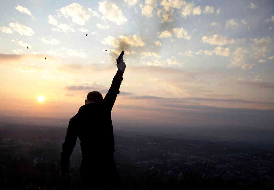 At sunset in the outskirts of Grozny, Kazbek Mutsaev, 29, fires celebratory gunshots as part of an age-old wedding tradition in Chechnya.