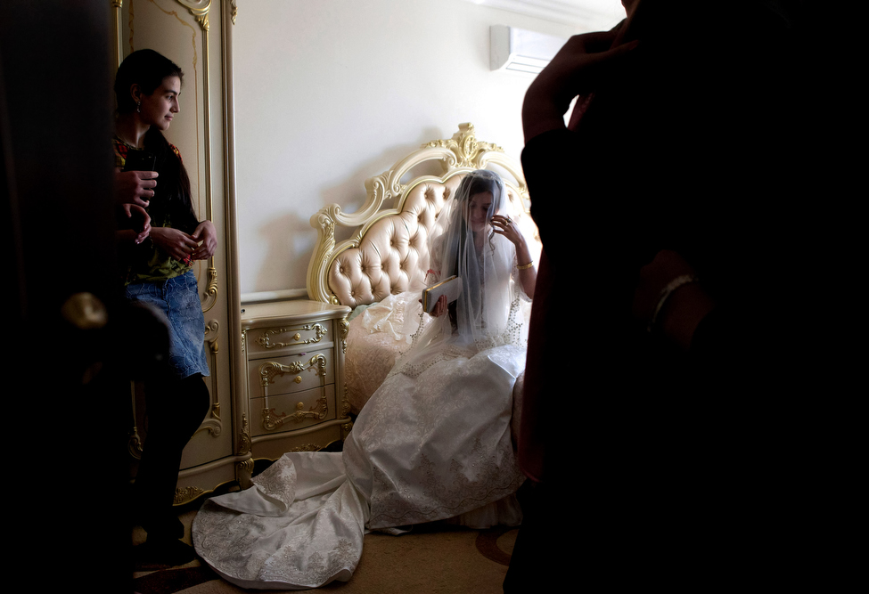 Jamila Idalova, 16, on her wedding day. The teen bride was kidnapped by her boyfriend. Idalova's family eventually approved the marriage. Bridal kidnappings are outlawed under Ramzan Kadyrov, head of the Chechen Republic.