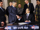 State Senator Jeff Klein (L-R), Assembly Speaker Sheldon Silver, Lieutenant Governor Robert Duffy and Senator Andrea Stewart-Cousins congratulate New York Governor Andrew Cuomo after he signed the New York Secure Ammunition and Firearms Enforcement Act on Tuesday. State Senator Jeff Klein (L-R), Assembly Speaker Sheldon Silver, Lieutenant Governor Robert Duffy and Senator Andrea Stewart-Cousins congratulate New York Governor Andrew Cuomo after he signed the New York Secure Ammunition and Firearms Enforcement Act on Tuesday.