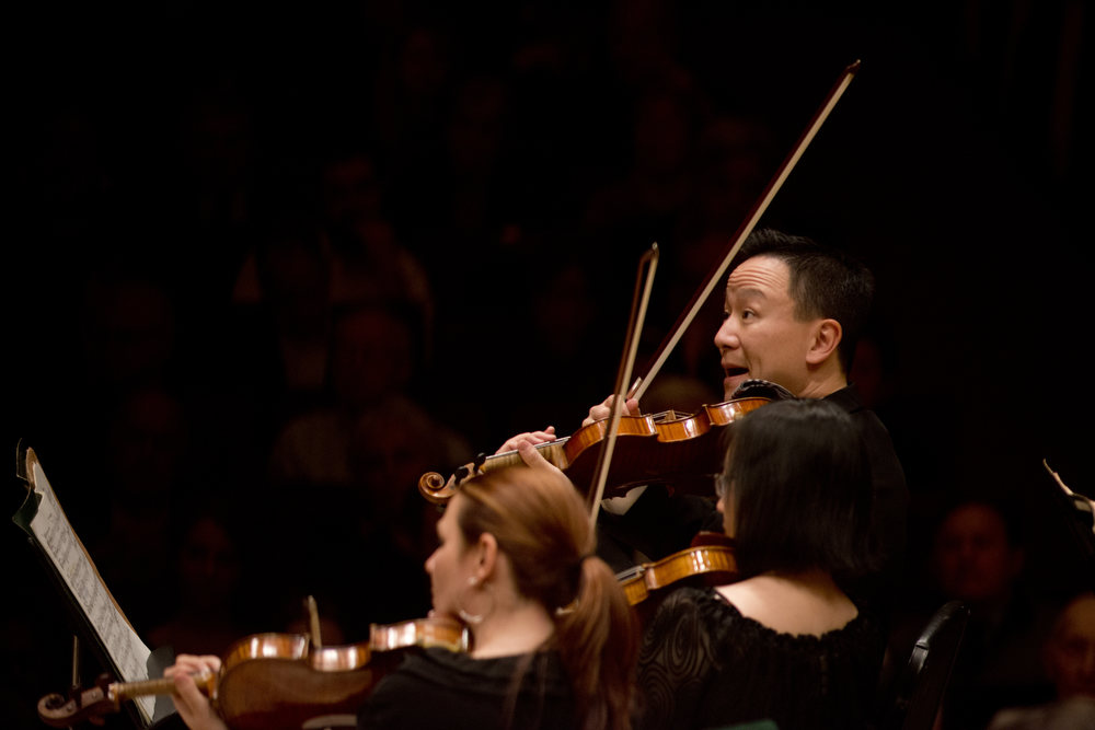 Concertmaster David Kim heads up the Philly string section with enthusiasm in Maurice Ravel's orchestral showpiece, <em>La Valse</em>.