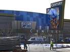 Workers dismantle the fence around the remodeled Century theater in Aurora, Colo., in preparation for the cinema's reopening Thursday. The theater's owner sent 2,000 invitations to the private event, being held for victims' families and first responders. Workers dismantle the fence around the remodeled Century theater in Aurora, Colo., in preparation for the cinema's reopening Thursday. The theater's owner sent 2,000 invitations to the private event, being held for victims' families and first responders.