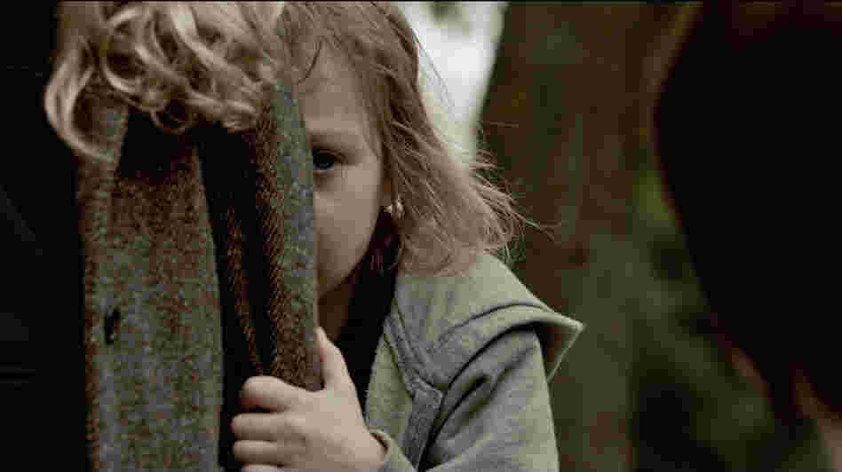 Victoria (Megan Charpentier) and her sister, Lilly (Isabelle Nelisse), are near-feral orphans in the horror thriller Mama. Victoria (Megan Charpentier) and her sister, Lilly (Isabelle Nelisse), are near-feral orphans in the horror thriller Mama.