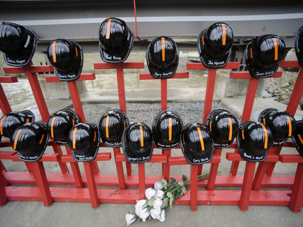Mine helmets and painted crosses were placed at the entrance to Massey Energy's Upper Big Branch coal mine as a memorial to the 29 miners killed there. Mine helmets and painted crosses were placed at the entrance to Massey Energy's Upper Big Branch coal mine as a memorial to the 29 miners killed there.