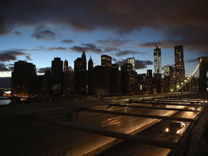 Hurricane Sandy exposed weaknesses in New York City's electricity grid. Experts say work can be done to revamp it so it's more tolerant to support backup solar power. Here, the New York City skyline, seen from the Brooklyn Bridge, on Nov. 3.