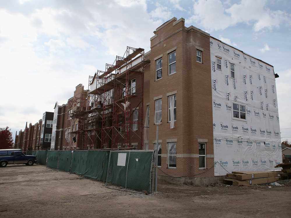 Going up in Chicago: Row houses under construction. Going up in Chicago: Row houses under construction.