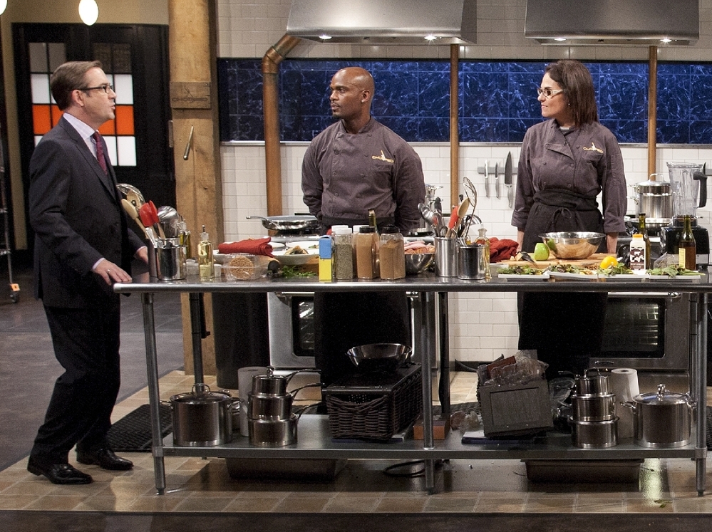Ted Allen addresses the chefs competing on the Chopped Holiday Special.