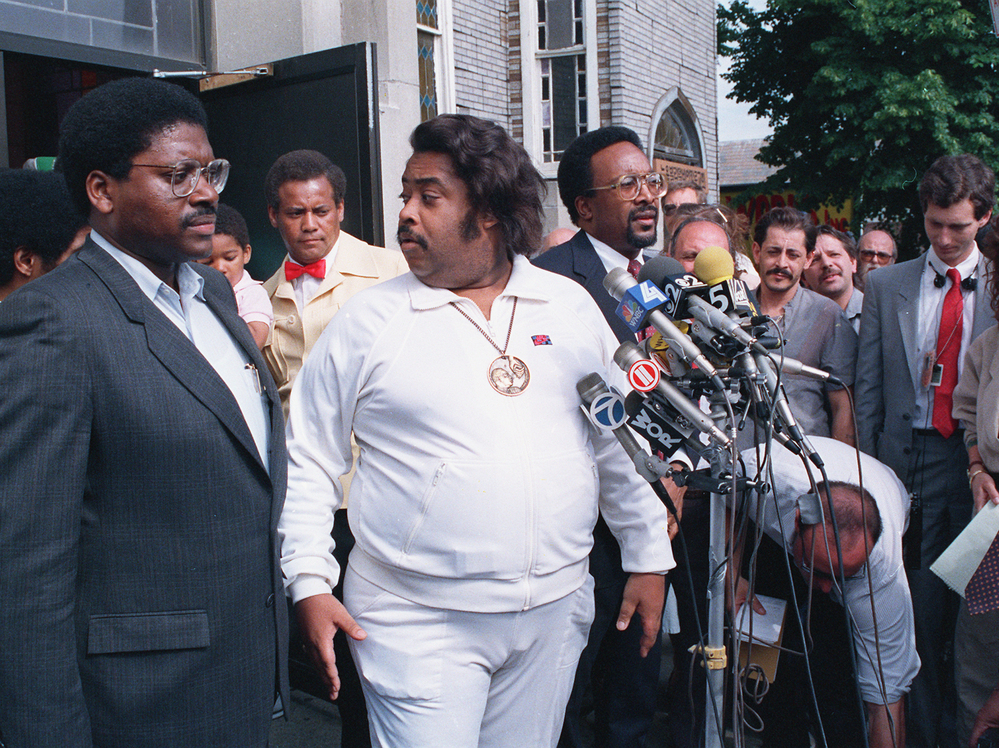 The Rev. Al Sharpton (center) holds a news conference with other advisers in the Tawana Brawley case in the Queens borough of New York in 1988.