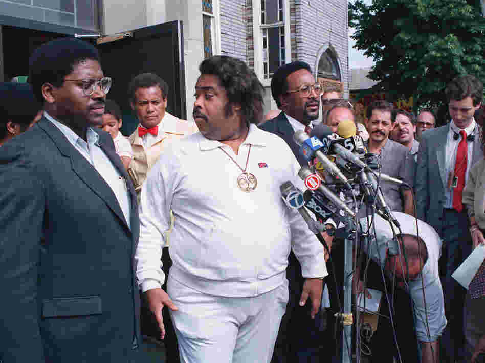 The Rev. Al Sharpton (center) holds a news conference with other advisers in the Tawana Brawley case in the Queens borough of New York in 1988.