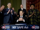 New York Gov. Andrew Cuomo signed a new gun control law in Albany on Tuesday. It's the nation's first gun law enacted since the December school shooting in Newtown, Conn. New York Gov. Andrew Cuomo signed a new gun control law in Albany on Tuesday. It's the nation's first gun law enacted since the December school shooting in Newtown, Conn.