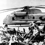 The remains of a burned-out U.S. helicopter and an abandoned chopper in the eastern desert of Iran on April 27, 1980, after the aborted American commando raid to free U.S. Embassy hostages.