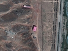 A photo from Aug. 15, 2012, supplied by the Institute for Science and International Security, shows buildings at the Parchin military base south of Tehran, Iran, shrouded in pink tarps. It's believed to be an effort to stop the U.N nuclear agency from monitoring the site, which is suspected of being used for secret work on atomic weapons. A photo from Aug. 15, 2012, supplied by the Institute for Science and International Security, shows buildings at the Parchin military base south of Tehran, Iran, shrouded in pink tarps. It's believed to be an effort to stop the U.N nuclear agency from monitoring the site, which is suspected of being used for secret work on atomic weapons.