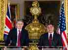 British Defense Minister Philip Hammond (left) and U.S. Defense Secretary Leon Panetta hold a joint press conference on the Algerian hostage crisis Saturday in London.