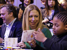 Chelsea Clinton makes cards with 8-year-old Addison Rose on the National Mall on Saturday as part of the National Day of Service events. Clinton, daughter of former President Bill Clinton and Secretary of State Hillary Clinton, is the honorary chair of the National Day of Service. Chelsea Clinton makes cards with 8-year-old Addison Rose on the National Mall on Saturday as part of the National Day of Service events. Clinton, daughter of former President Bill Clinton and Secretary of State Hillary Clinton, is the honorary chair of the National Day of Service.