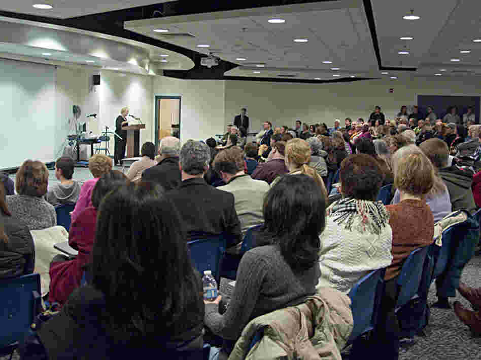 Newtown First Selectwoman Pat Llodra speaks to community members at a meeting about the future of Sandy Hook Elementary.