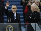 President Barack Obama waves after his speech while Vice President Joe Biden applauds at the ceremonial swearing-in at the U.S. Capitol during the 57th Presidential Inauguration in Washington on Monday.