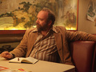 Journalist Arnie Blondestone (Paul Giamatti) interprets the bizarro story at the heart of the too-twisty horror fantasy John Dies at the End. Journalist Arnie Blondestone (Paul Giamatti) interprets the bizarro story at the heart of the too-twisty horror fantasy John Dies at the End.