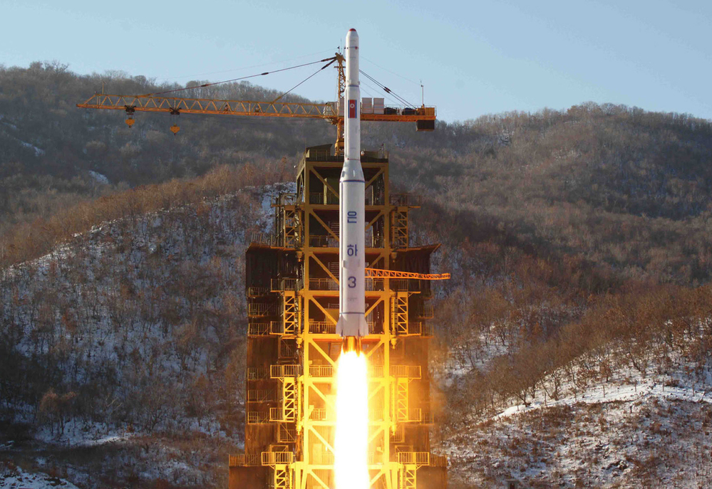 This picture taken by North Korea's official Korean Central News Agency on December 12, 2012 shows North Korean rocket Unha-3, carrying the satellite Kwangmyongsong-3.