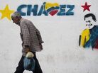 A man walks past a mural of Venezuelan President Hugo Chavez in Caracas, on Jan. 11. A man walks past a mural of Venezuelan President Hugo Chavez in Caracas, on Jan. 11.