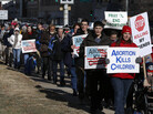 Abortion opponents march to a rally at the Kansas Statehouse in Topeka, Kan., on the 40th anniversary of Roe v. Wade. Kansas is among several states that have enacted new restrictions on abortion in recent years. Abortion opponents march to a rally at the Kansas Statehouse in Topeka, Kan., on the 40th anniversary of Roe v. Wade. Kansas is among several states that have enacted new restrictions on abortion in recent years.