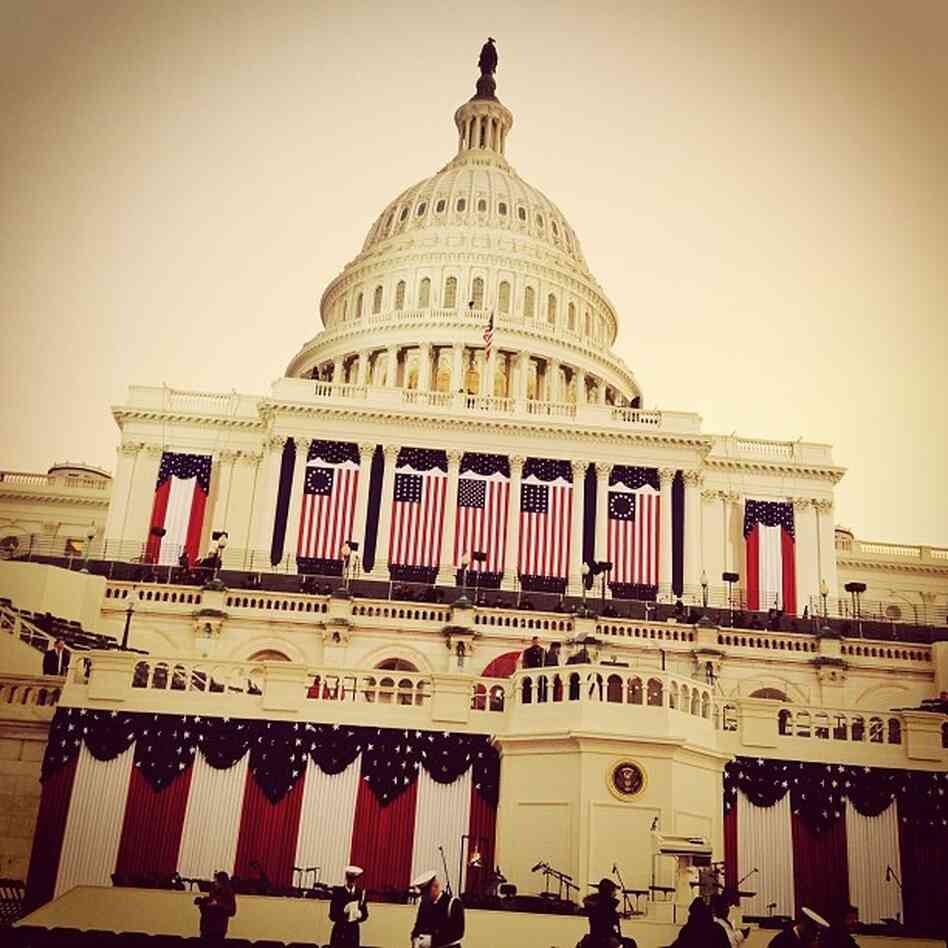 An Instagram photo from White House Correspondent Ari Shapiro shows the U.S. Capitol draped in flags on inauguration morning. Shapiro's caption: "Sun rising over the dome. Earlybird filter seems appropriate."