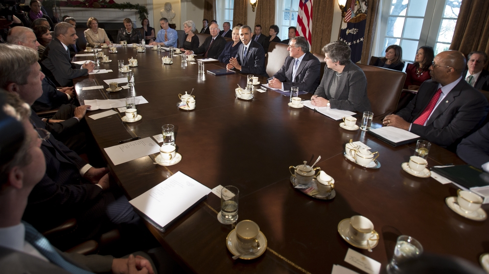 President Barack Obama, center, makes a statement to the media before the start of a meeting with his Cabinet on Nov. 28, 2012.