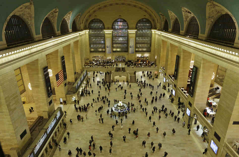 Travelers cross the main concourse of New York's Grand Central Terminal in January. The terminal marks its 100th anniversary on Feb. 2.