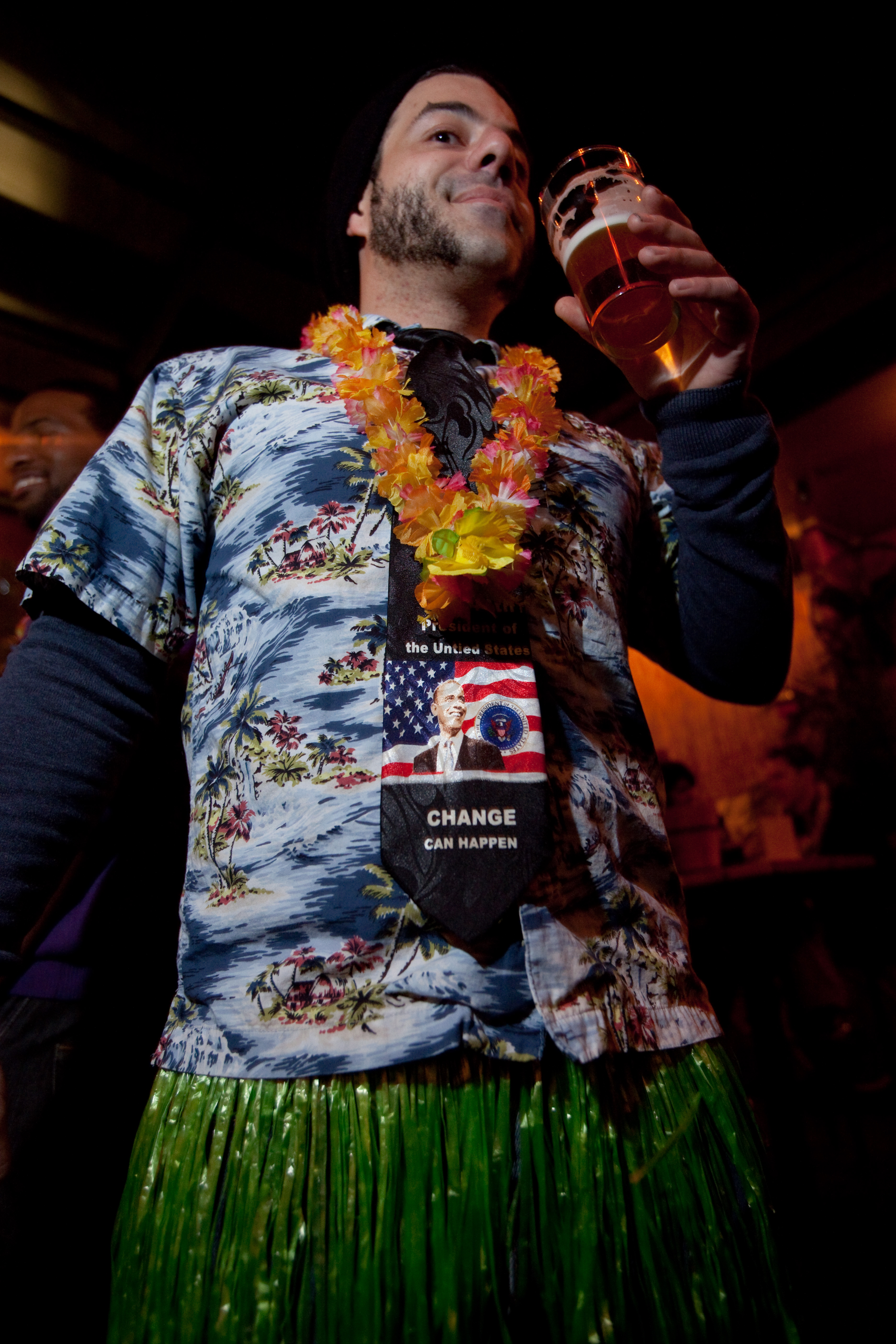 Nahem Simon, beer director at Jack Rose, gets into the spirit at the luau.