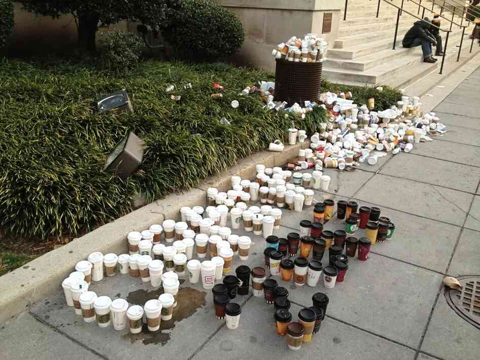 From the looks of Production Assistant Liz Baker's "trash art" photo, it appears the unofficial Inauguration Day drink of choice was caffeinated.