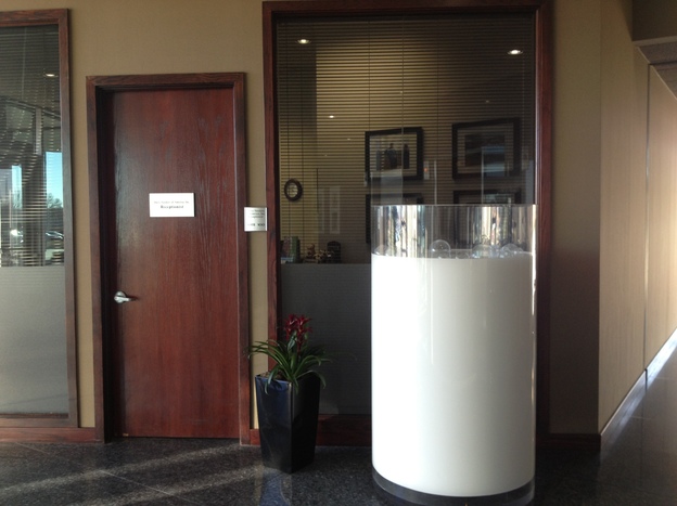 This 5-foot plexiglass piece of art resembling a freshly poured glass of milk sits near the door at Dairy Farmers of America headquarters in Kansas City, Mo.