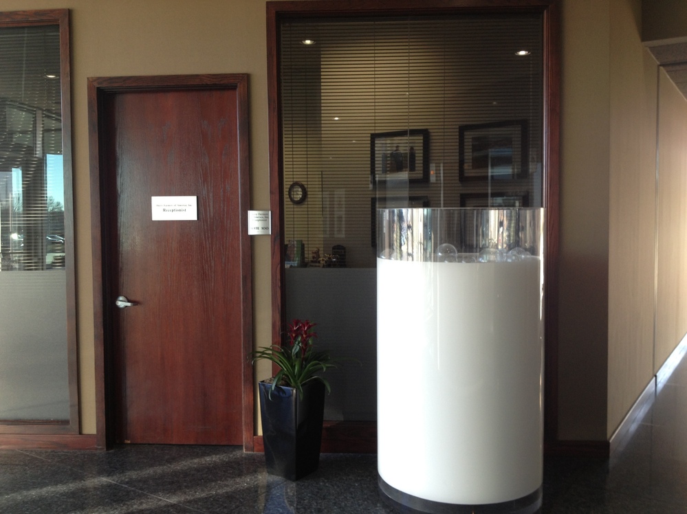 This 5-foot plexiglass piece of art, resembling a freshly poured glass of milk, sits near the door to the headquarters of the Dairy Farmers of America, in Kansas City, Mo.
