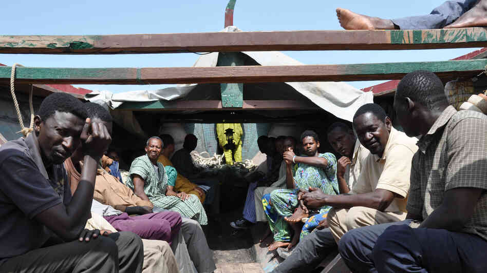 More than 30 men set out to sea in the titular boat of The Pirogue. With that many actors and only an hour of time, not every character gets fleshed out — but the director's eye for singular faces helps. More than 30 men set out to sea in the titular boat of The Pirogue. With that many actors and only an hour of time, not every character gets fleshed out — but the director's eye for singular faces helps.