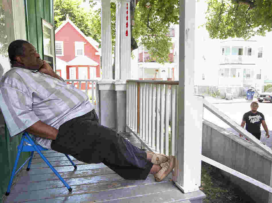 Nathaniel Davis sits on his porch a couple of days after the verdict for the murder trial of his son.