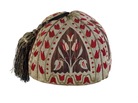 The silken tassel on this skull cap, woven in Aleppo around 1800, recalls a more prosperous and tranquil time in that now-beleaguered Syrian hub. The silken tassel on this skull cap, woven in Aleppo around 1800, recalls a more prosperous and tranquil time in that now-beleaguered Syrian hub.