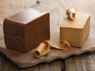A truckload of brunost cheese, like the kind seen here, recently caught fire in a Norwegian tunnel. A truckload of brunost cheese, like the kind seen here, recently caught fire in a Norwegian tunnel.