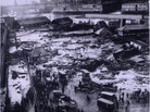 Twenty-one people were killed on Commercial Street in Boston's North End when a giant tank of molasses exploded in 1919. Twenty-one people were killed on Commercial Street in Boston's North End when a giant tank of molasses exploded in 1919.