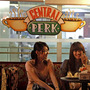Customers chat at a Beijing cafe modeled after the Central Perk cafe in the hit American sitcom Friends, in 2010. Nearly a decade after the series ended, the popularity of Friends continues among young Chinese, who use the show as a language-learning tool and enjoy its depiction of young Americans. Customers chat at a Beijing cafe modeled after the Central Perk cafe in the hit American sitcom Friends, in 2010. Nearly a decade after the series ended, the popularity of Friends continues among young Chinese, who use the show as a language-learning tool and enjoy its depiction of young Americans.