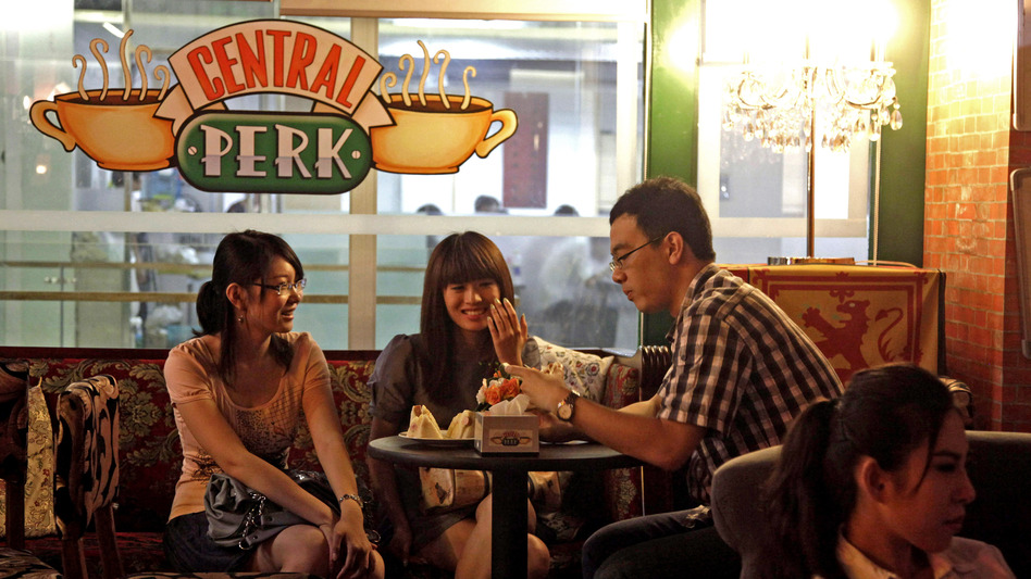 Customers chat at a Beijing cafe modeled after the Central Perk cafe in the hit American sitcom Friends, in 2010. Nearly a decade after the series ended, the popularity of Friends continues among young Chinese, who use the show as a language-learning tool and enjoy its depiction of young Americans.