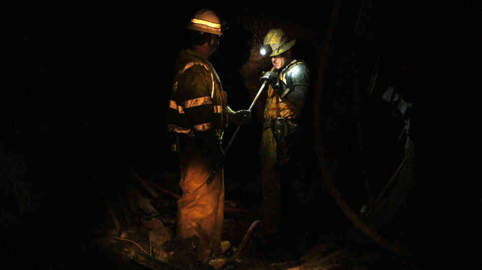Miner Steve Ator cleans a drill bit inside the Lincoln Project Mine, in Sutter Creek, Calif.