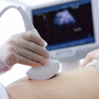 A woman gets a sonogram