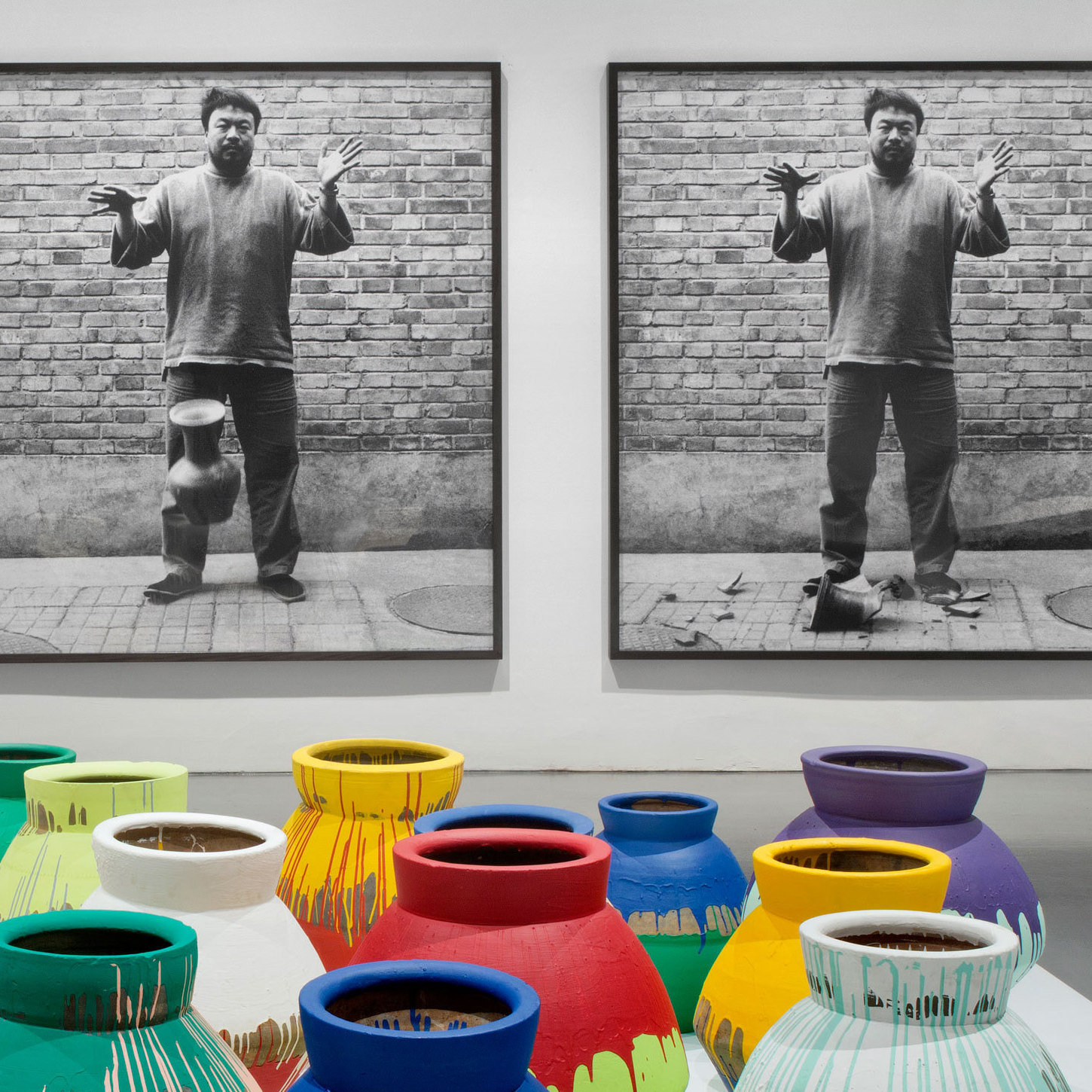 Ai's most controversial work involves altering revered objects, like these paint-covered ancient Chinese vases, or destroying them altogether, as shown in the photographic triptych, Dropping a Han Dynasty Urn.