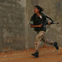 A female Israeli soldier runs during an urban warfare exercise at an army training facility near Zeelim, Israel, on June 19, 2008. A female Israeli soldier runs during an urban warfare exercise at an army training facility near Zeelim, Israel, on June 19, 2008.