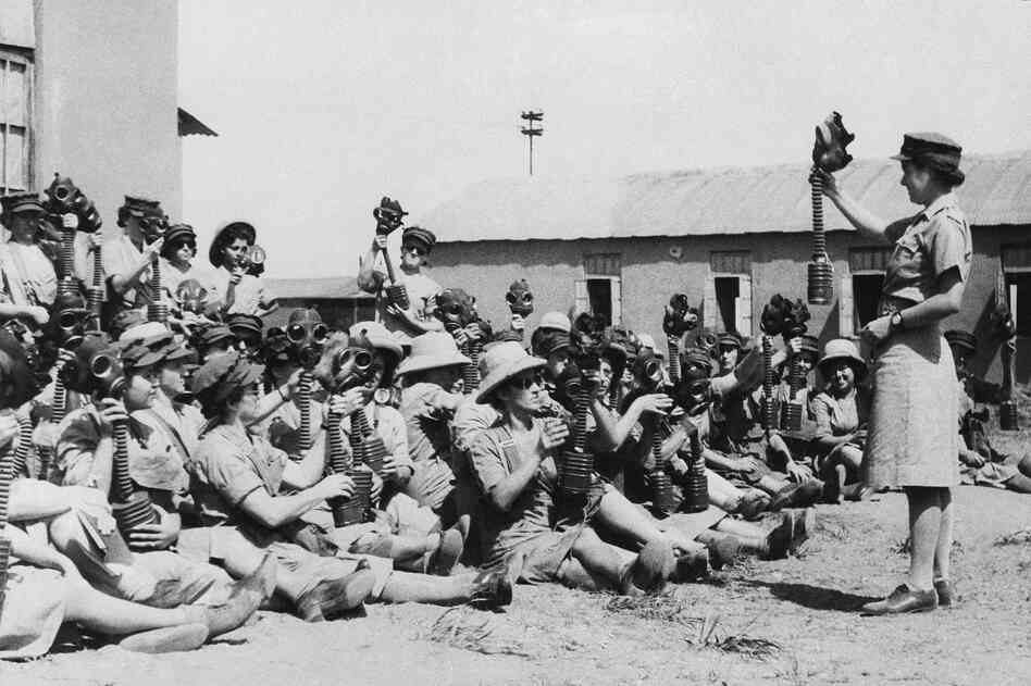 Jewish women in the Palestine Auxiliary Territorial Service of the British Army learn how to use gas masks, Oct. 14, 1942. Many of them were in service on the Egyptian front.