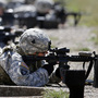 Female soldiers from 1st Brigade Combat Team, 101st Airborne Division train on a firing range in Fort Campbell, Ky., in preparation for their deployment to Afghanistan. The Pentagon announced Thursday that women will no longer be banned from combat roles. Female soldiers from 1st Brigade Combat Team, 101st Airborne Division train on a firing range in Fort Campbell, Ky., in preparation for their deployment to Afghanistan. The Pentagon announced Thursday that women will no longer be banned from combat roles.