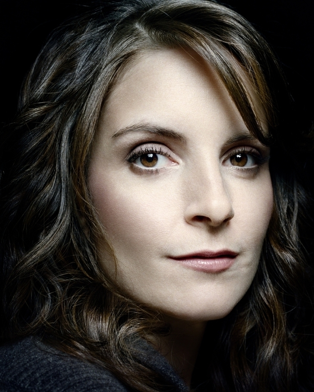 "I was worried about being the mouthpiece for anyone and being politicized personally," Tina Fey says about playing Sarah Palin on Saturday Night Live. "It ended up being a lot of fun, but it did permanently politicize me in a way."