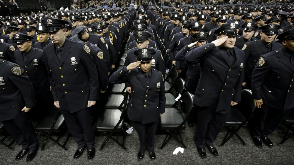A New York City police academy graduation ceremony on Dec. 28, 2012, where Mayor Michael Bloomberg announced that the New York murder rate has hit an all-time low. While some point to the NYPD's policing tactics to explain the decline, others say economic and demographic shifts are also at work. A New York City police academy graduation ceremony on Dec. 28, 2012, where Mayor Michael Bloomberg announced that the New York murder rate has hit an all-time low. While some point to the NYPD's policing tactics to explain the decline, others say economic and demographic shifts are also at work.