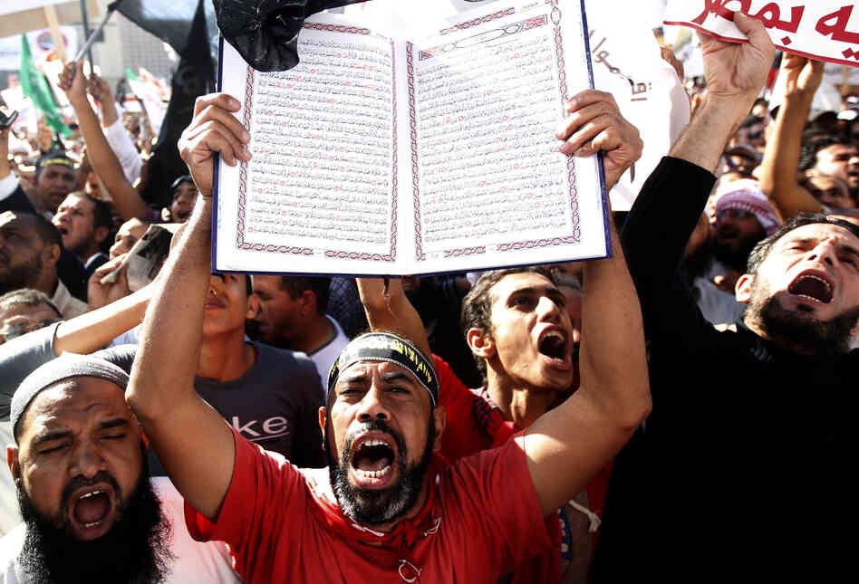 A protester holds a Quran at a Salafi rally for the enforcement of Islamic Shariah law last fall in Cairo's Tahrir Square. Repressed during the rule of President Hosni Mubarak, the country's ultra-conservative Salafis have seen a resurgence since the Arab Spring uprising.