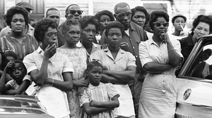 Mourners outside funeral services for Carol Robertson, one of four girls killed in the 1963 bombing.
