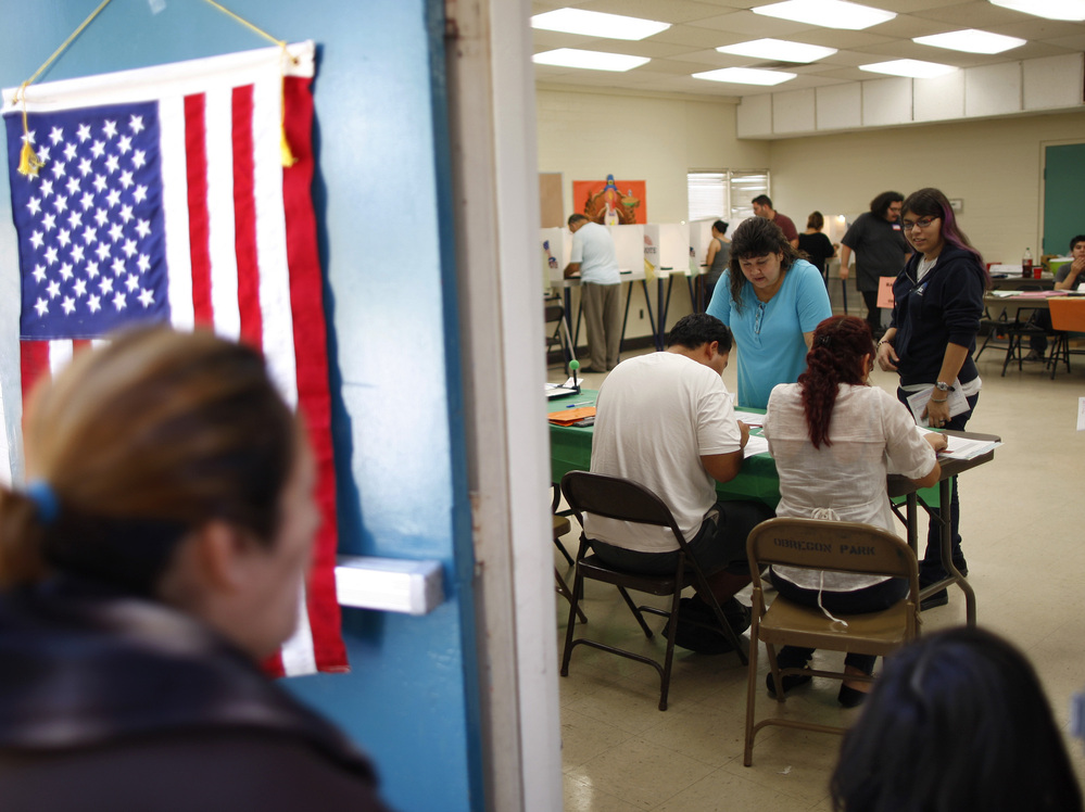 Latino voters, shown here on Election Day in Los Angeles, will grow in electoral power by the year 2020.
