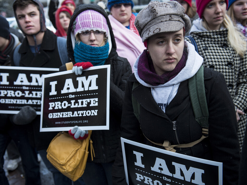 Anti-abortion activists at a protest Thursday outside the offices of Planned Parenthood in Washington, D.C. Friday, hundreds of thousands are expected at the March for Life rally.